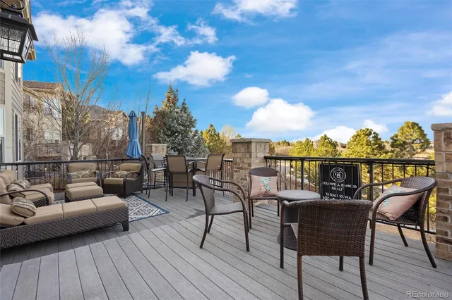 a view of a balcony with chairs