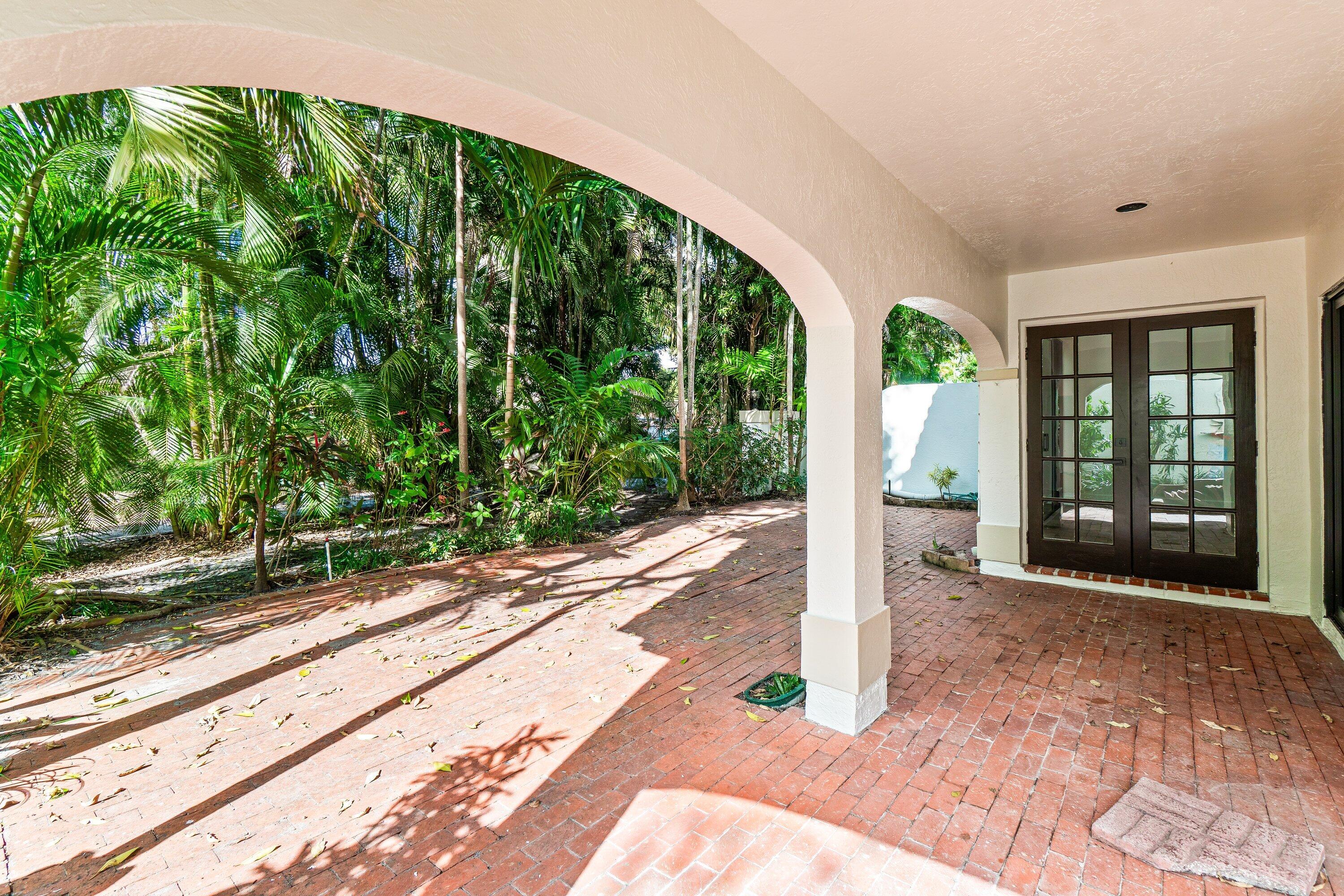 22548 Caravelle Circle, Unit 22548 Boca Raton, FL 33433 - Photo 40 of 40 a house view with a garden space