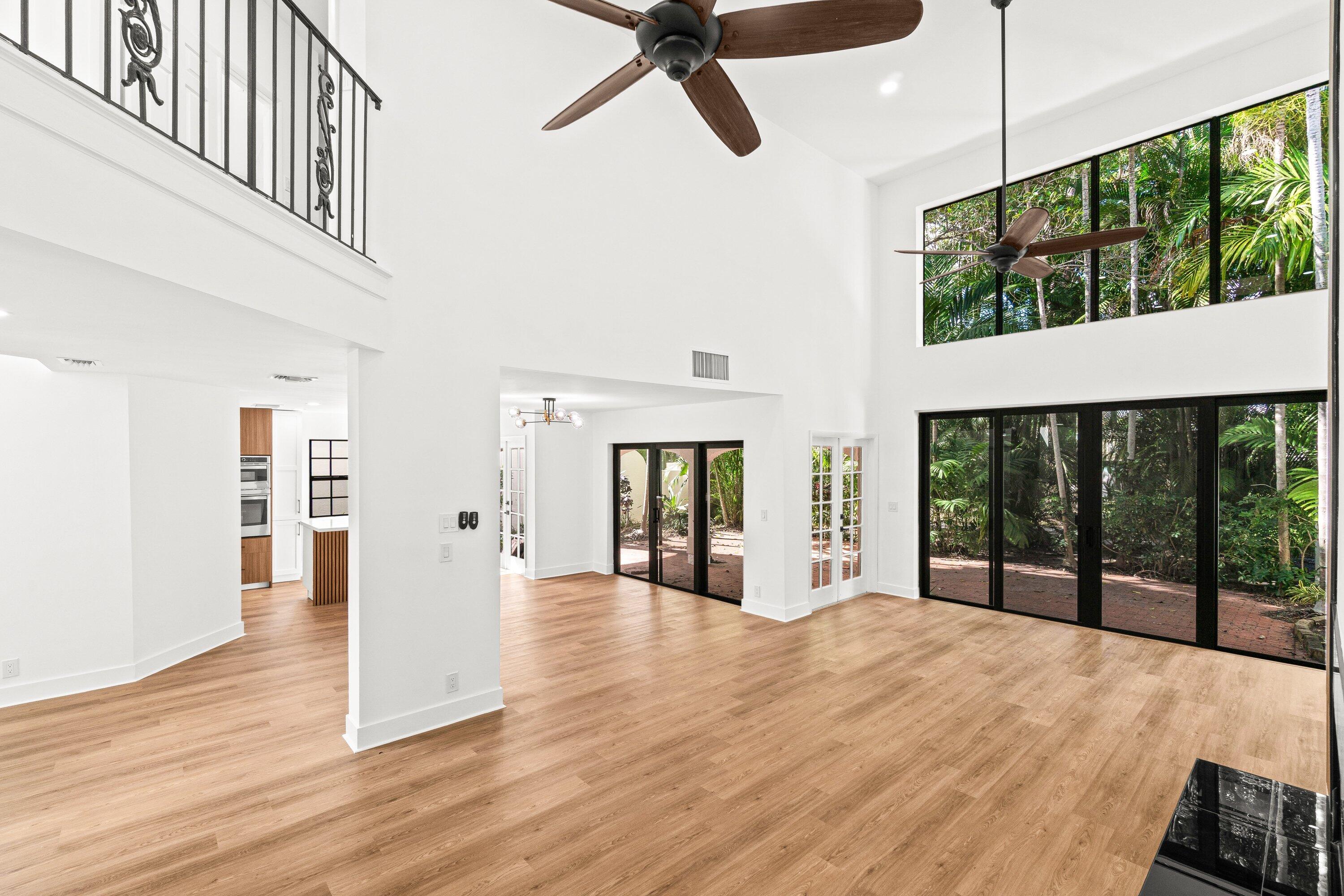 22548 Caravelle Circle, Unit 22548 Boca Raton, FL 33433 - Photo 9 of 40 a view of a room with wooden floor and a window