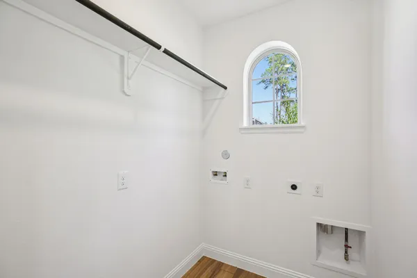 a picture of a bench in front of a wall