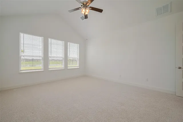 a bathroom with a sink double vanity granite tub and a mirror