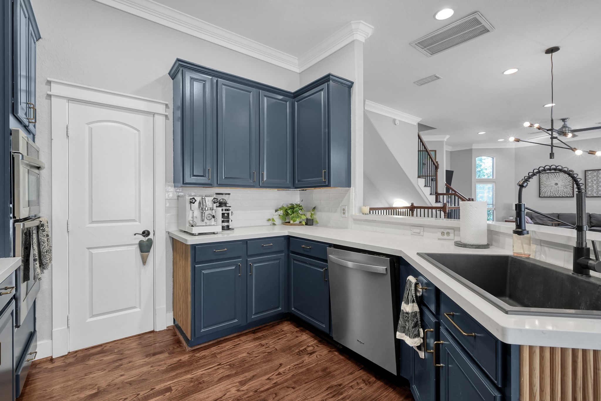 1328 West 23rd Street, Unit A Houston, TX 77008 - Photo 12 of 28 a kitchen with a sink cabinets and stainless steel appliances