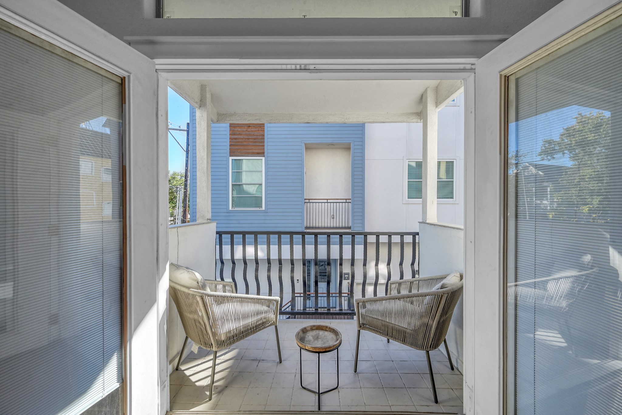 1328 West 23rd Street, Unit A Houston, TX 77008 - Photo 15 of 28 a view of a chair in the balcony