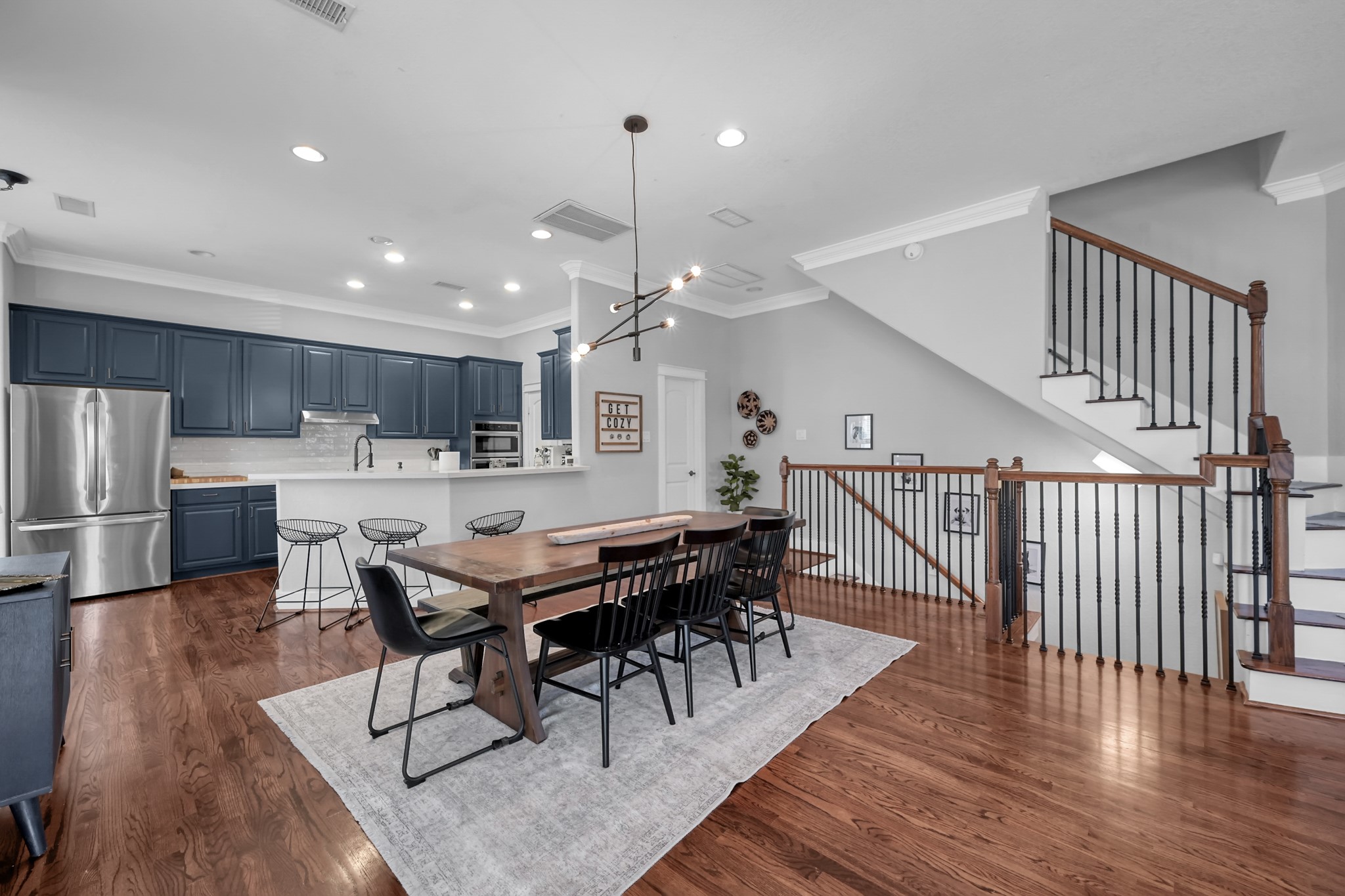 1328 West 23rd Street, Unit A Houston, TX 77008 - Photo 7 of 28 a view of a dining room with furniture and wooden floor