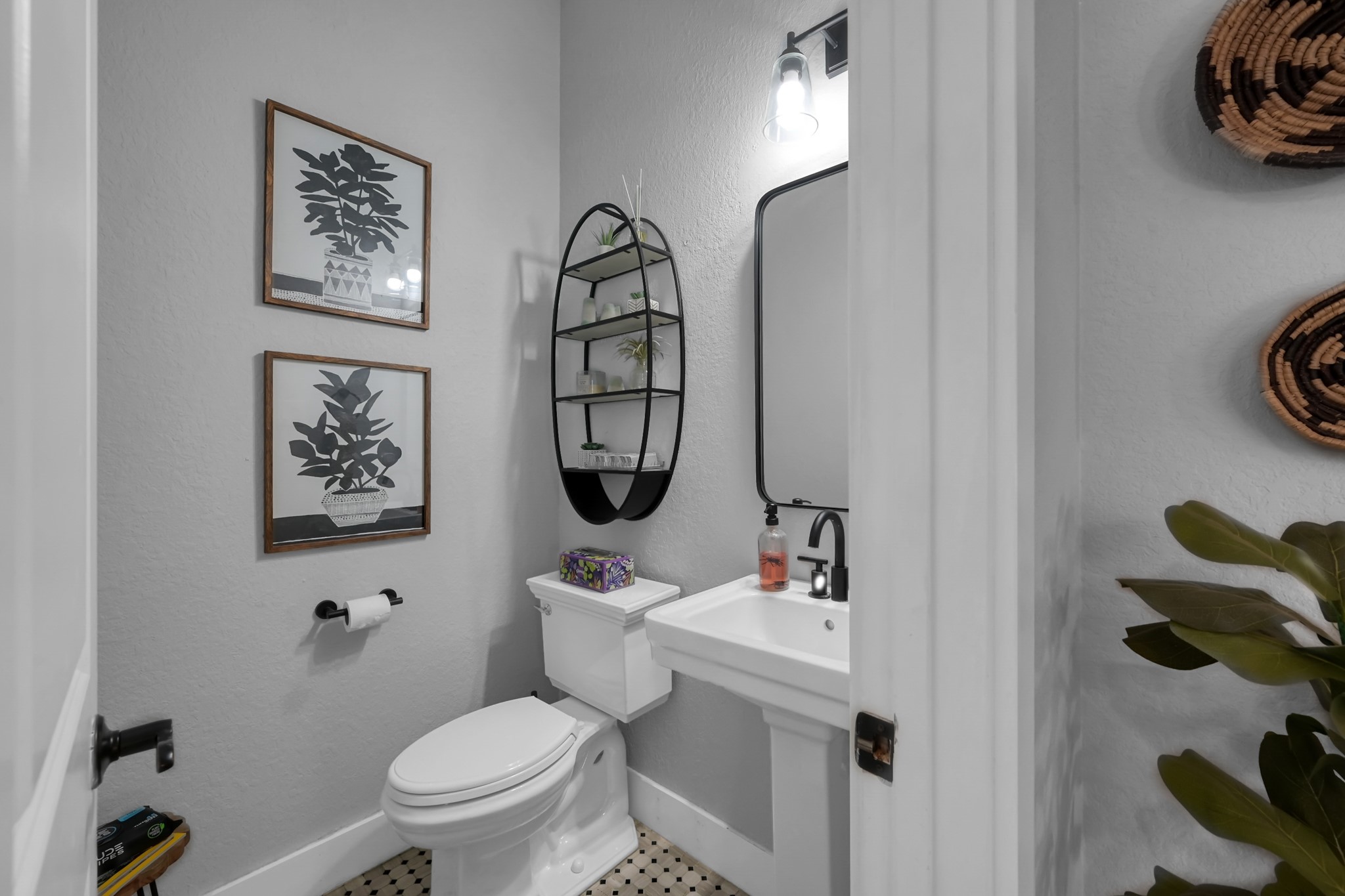 1328 West 23rd Street, Unit A Houston, TX 77008 - Photo 8 of 28 a bathroom with a toilet a sink and a mirror