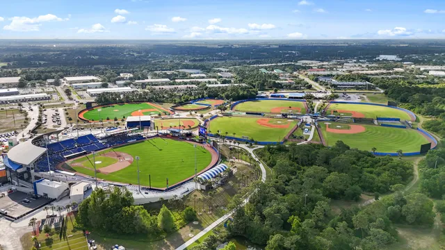 an aerial view of a swimming pool and outdoor space