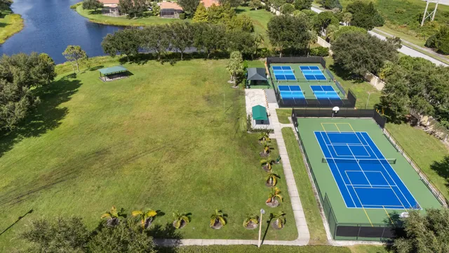 a balcony view with a yard