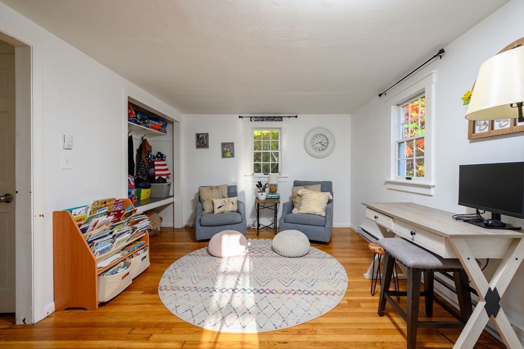 19 Langford Road Plymouth, MA 02360 - Photo 12 of 33 a living room with furniture and a flat screen tv