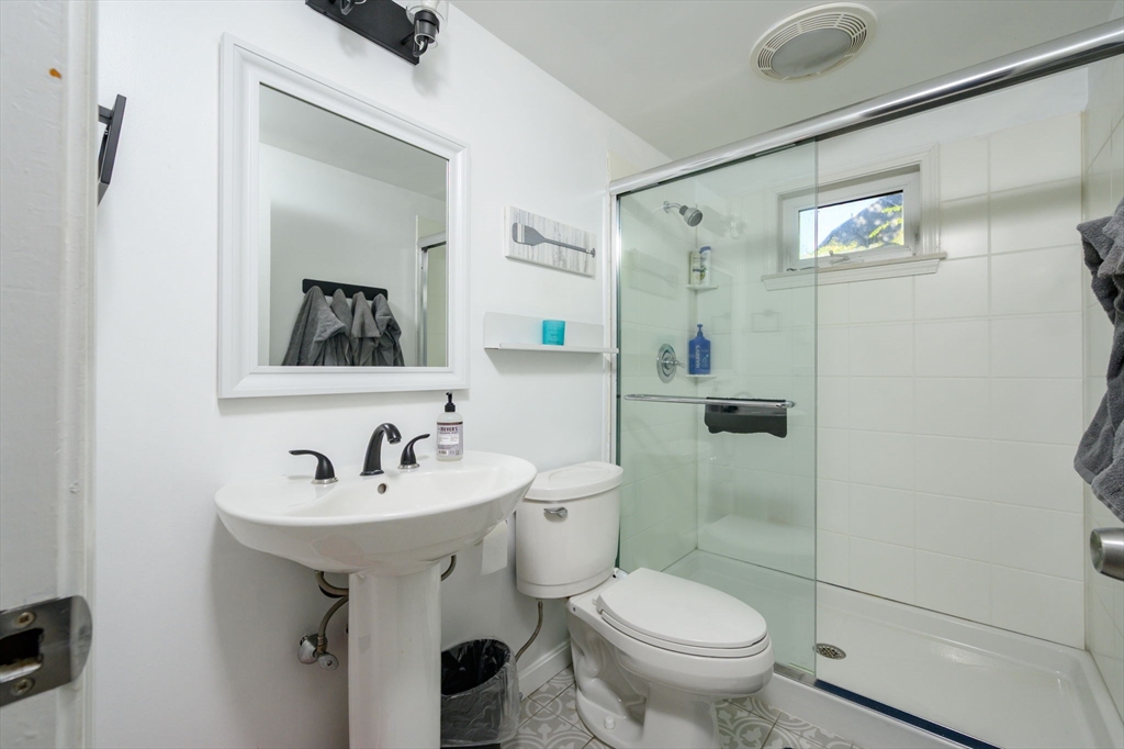 19 Langford Road Plymouth, MA 02360 - Photo 14 of 33 a bathroom with a sink toilet and shower