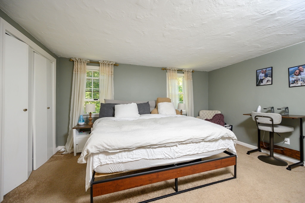 19 Langford Road Plymouth, MA 02360 - Photo 15 of 33 a bedroom with a bed and a desk