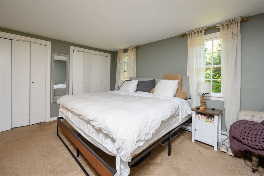 19 Langford Road Plymouth, MA 02360 - Photo 16 of 33 a bedroom with a bed and a window