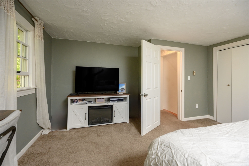 19 Langford Road Plymouth, MA 02360 - Photo 17 of 33 a view of a livingroom with furniture and a flat screen tv