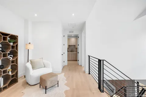 a view of livingroom with furniture and wooden floor