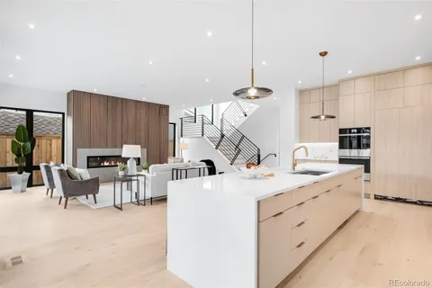 a view of kitchen with sink and window