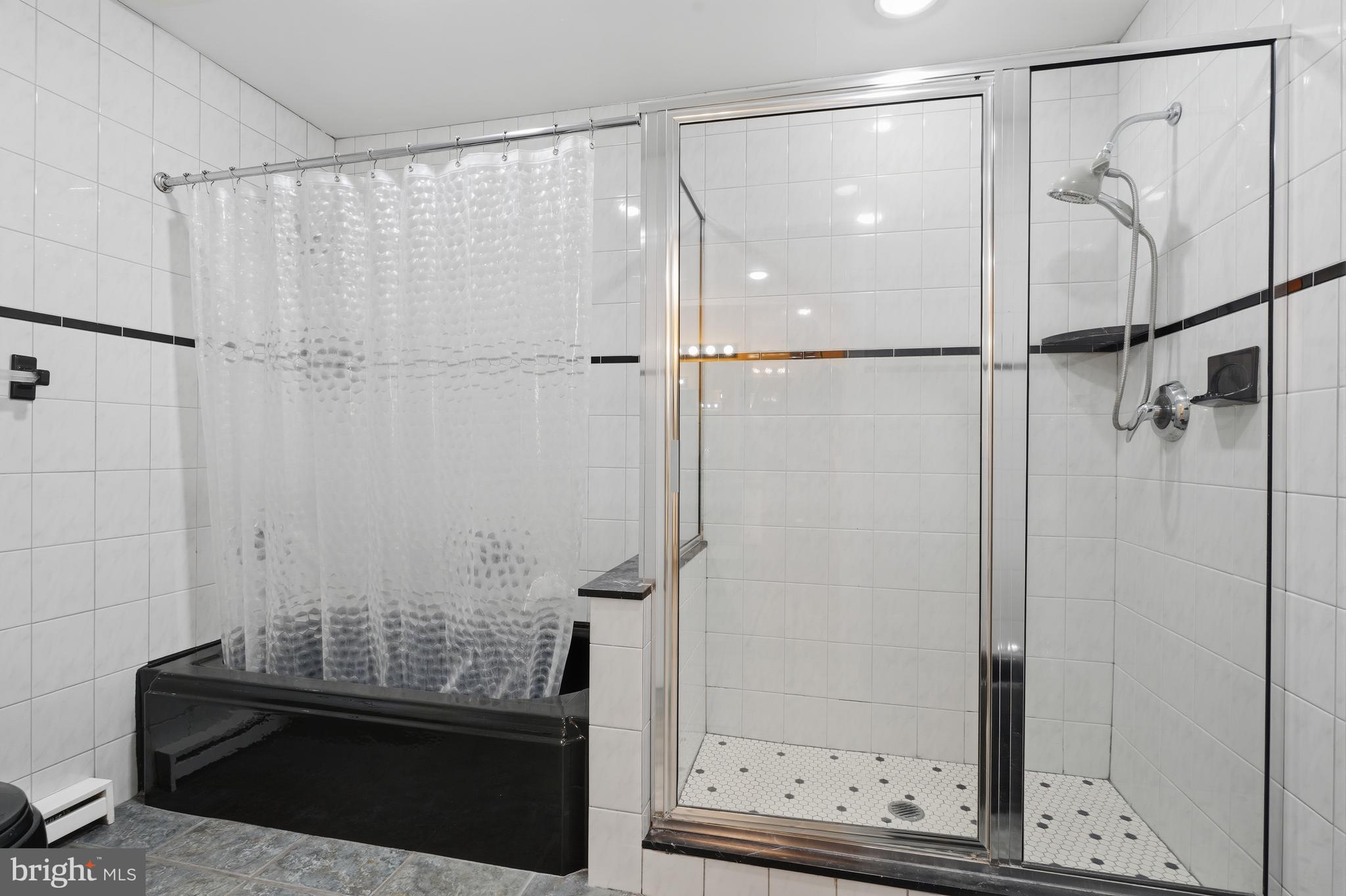 775 River Road Yardley, PA 19067 - Photo 47 of 75 Ensuite bath with walk-in shower plus tub