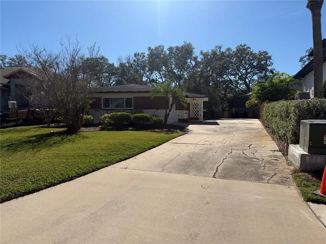 a house with garden in front of it