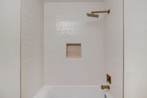 a bathroom with a bathtub