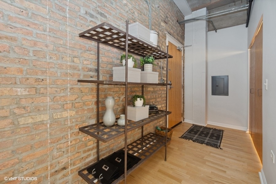 1503 South State Street, Unit 506 Chicago, IL 60605 - Photo 2 of 16 a bathroom with a shower