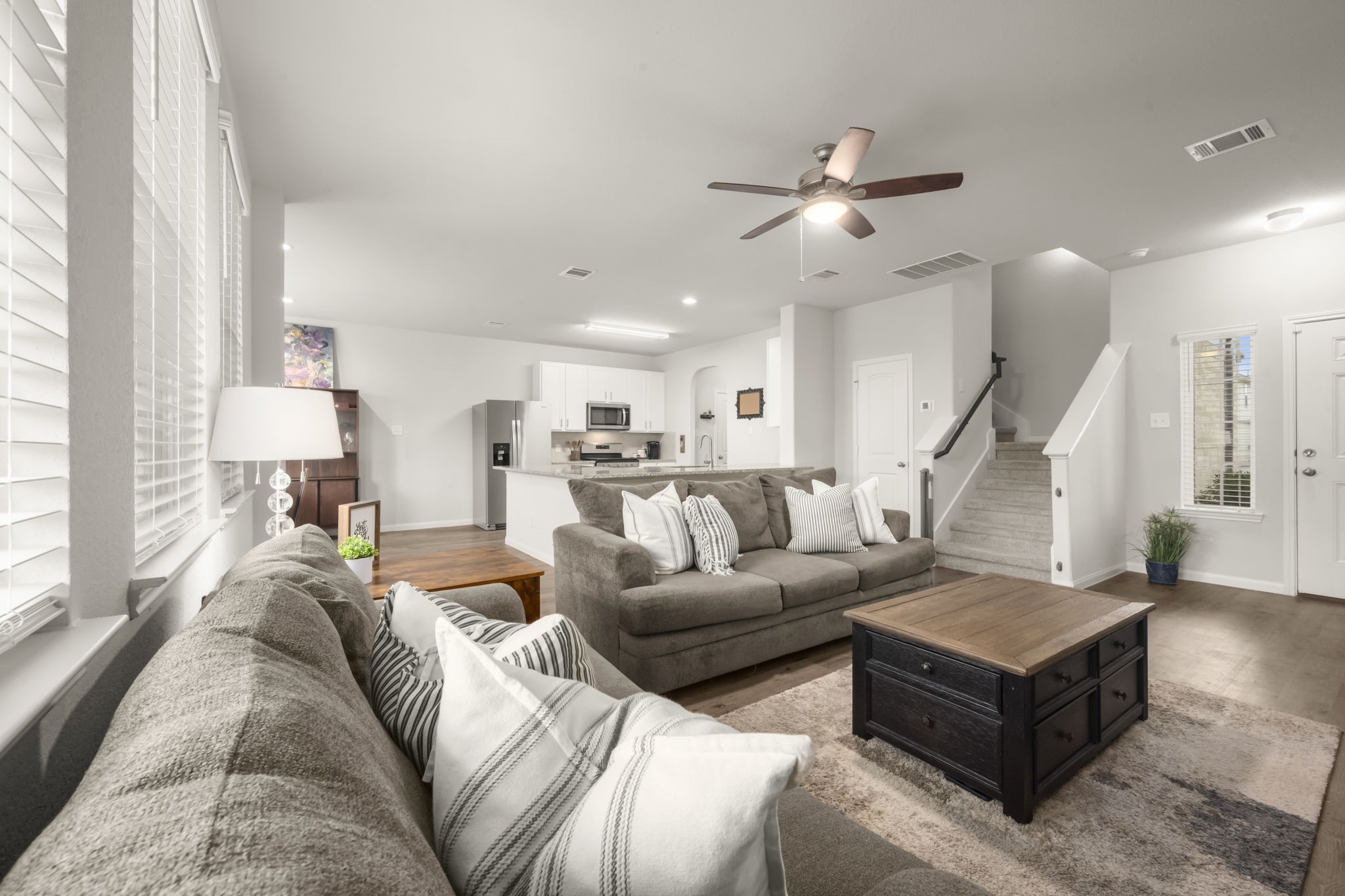 4915 Blue Jacaranda Way Spring, TX 77373 - Photo 6 of 30 Tall ceilings and bright windows flood the space with beautiful natural light.