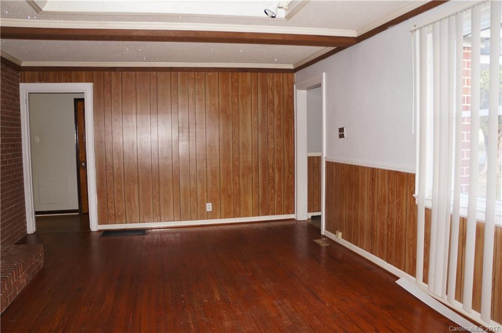 604 Banks Street Fort Mill, SC 29715 - Photo 2 of 16 a view of an empty room with wooden floor