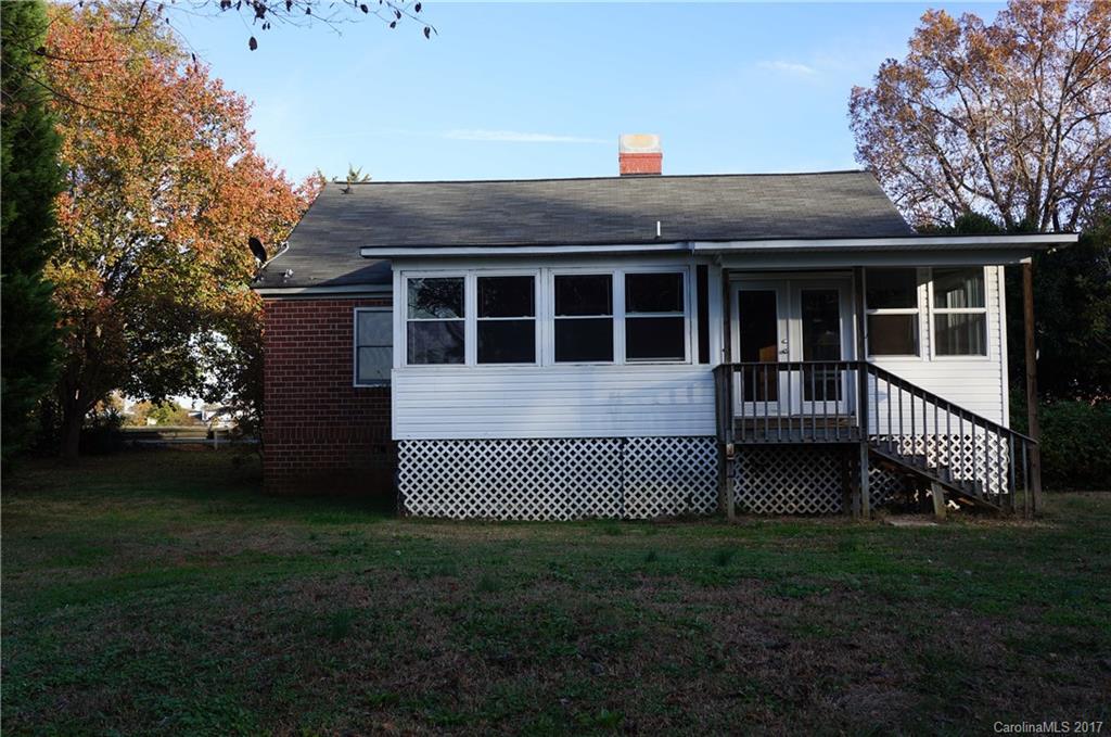 604 Banks Street Fort Mill, SC 29715 - Photo 12 of 16 a front view of a house with a garden