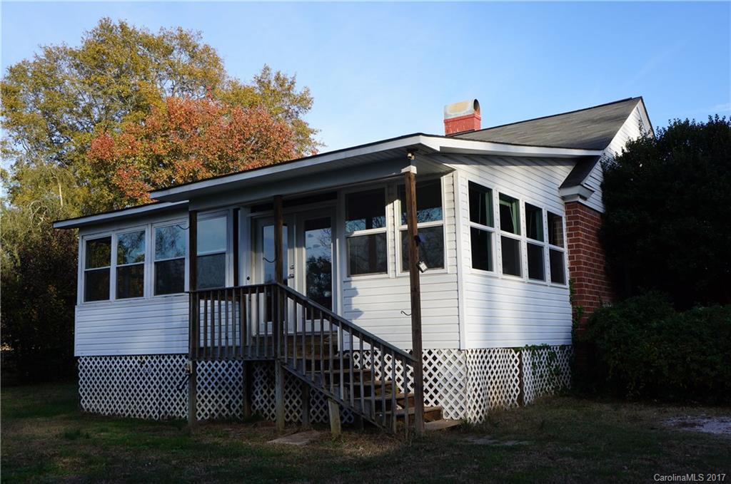 604 Banks Street Fort Mill, SC 29715 - Photo 16 of 16 a front view of a house with a yard