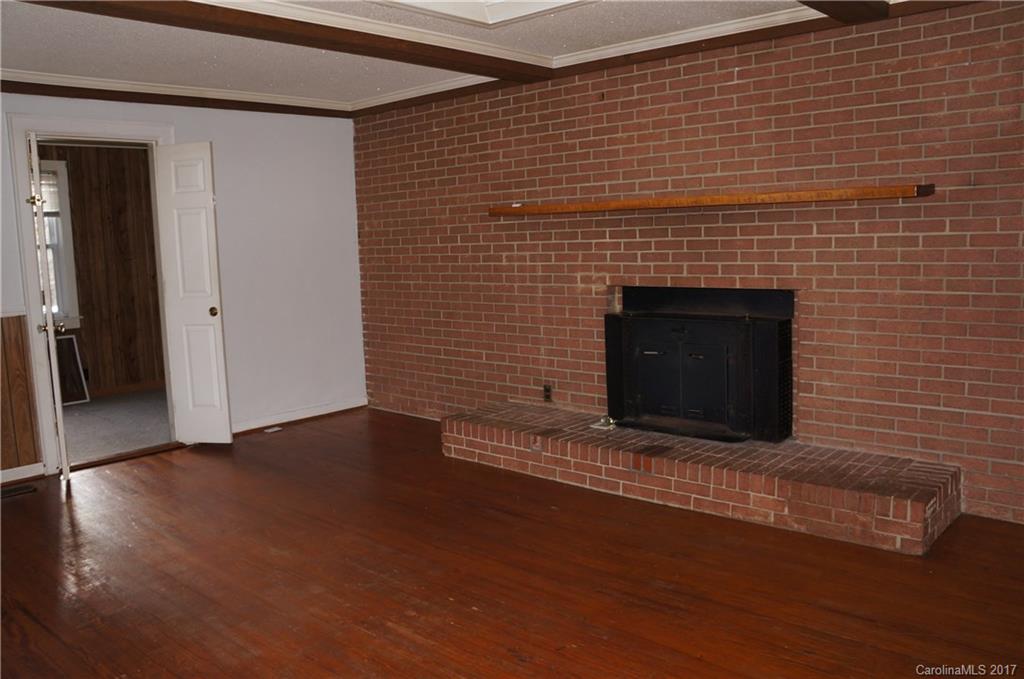 604 Banks Street Fort Mill, SC 29715 - Photo 3 of 16 a living room with a fireplace