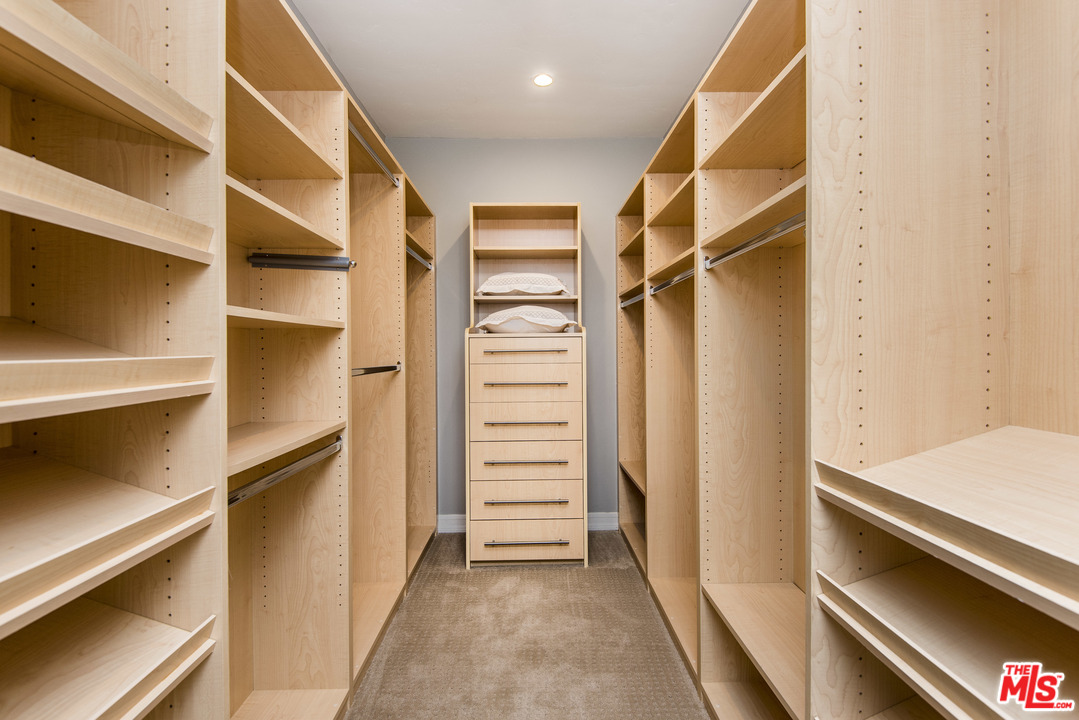3612 Surfwood Road Malibu, CA 90265 - Photo 13 of 19 a view of walk in closet with empty racks