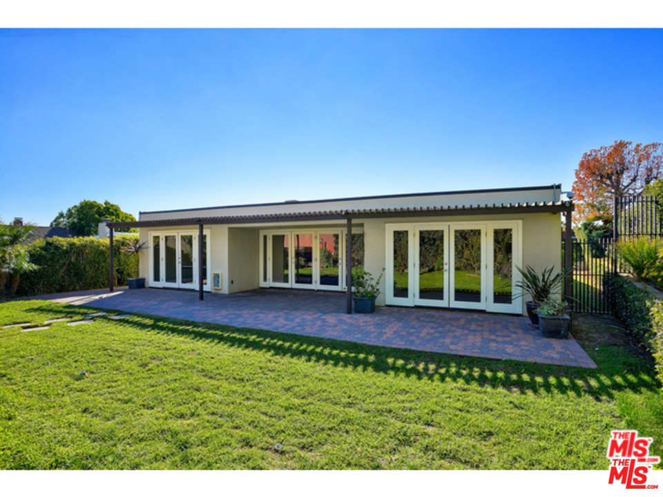 3612 Surfwood Road Malibu, CA 90265 - Photo 18 of 19 a view of house with swimming pool outdoor seating
