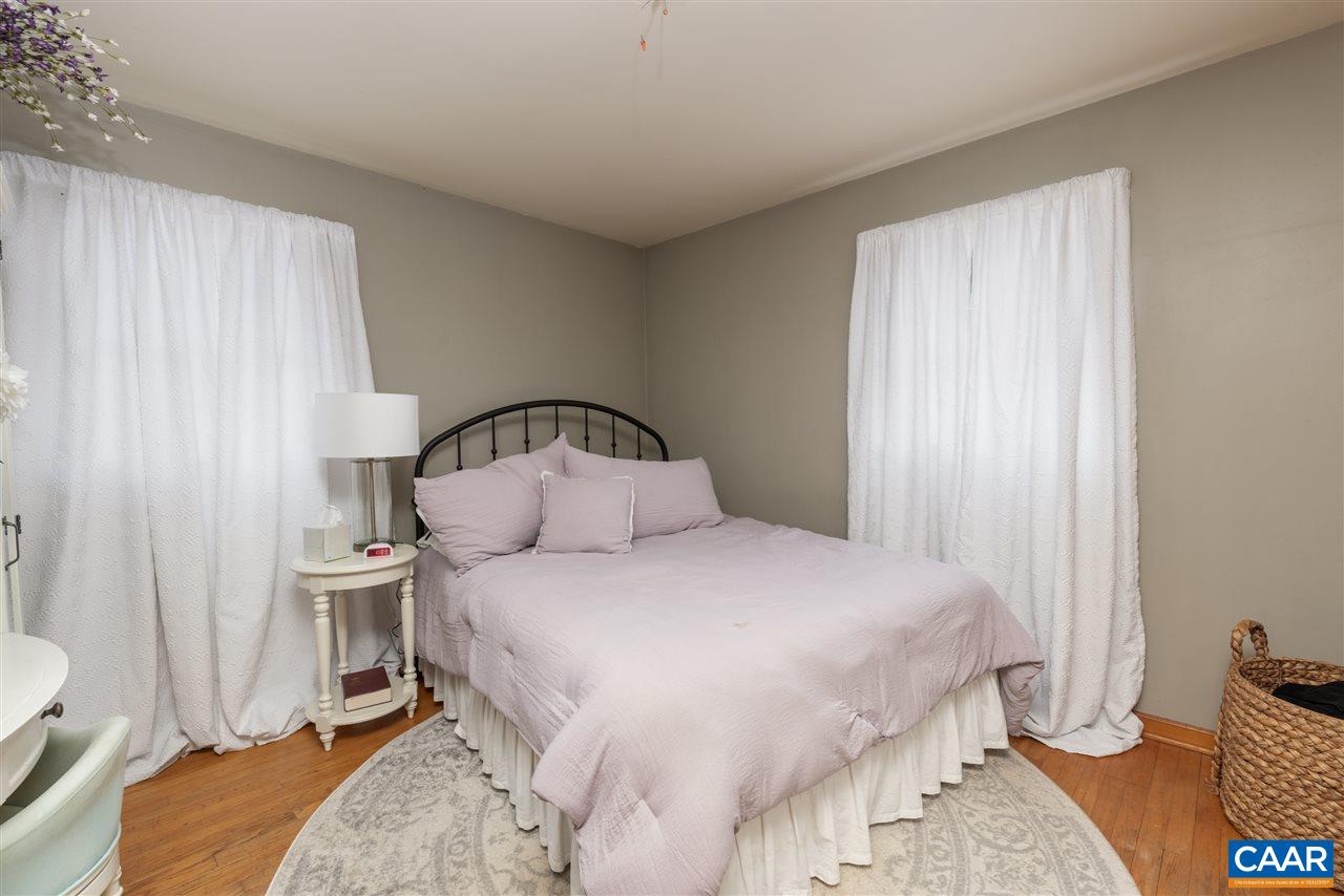 2564 Stagebridge Road Lovingston, VA 22949 - Photo 26 of 47 a bedroom with a bed and a window