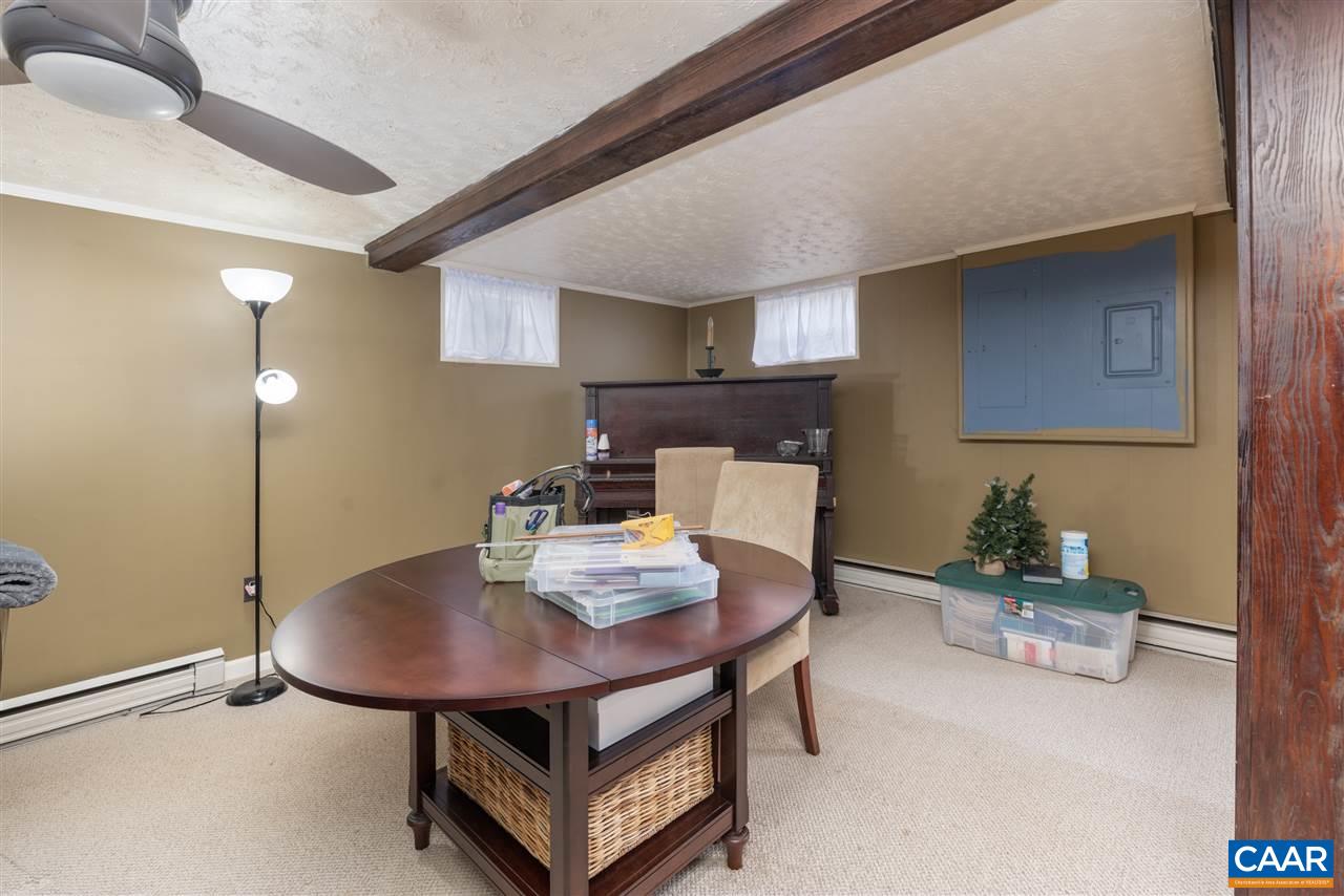 2564 Stagebridge Road Lovingston, VA 22949 - Photo 35 of 47 a view of a dining room with furniture