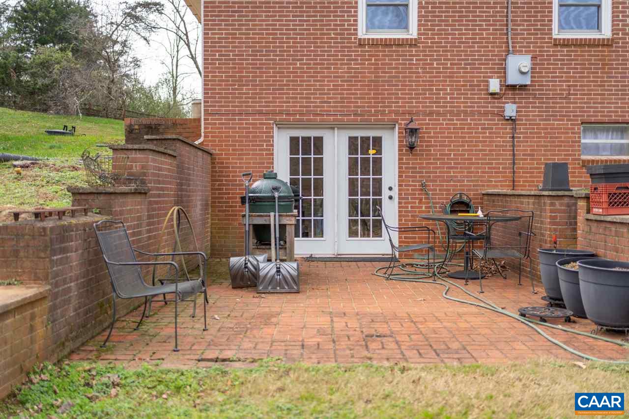 2564 Stagebridge Road Lovingston, VA 22949 - Photo 36 of 47 a backyard of a house with outdoor seating