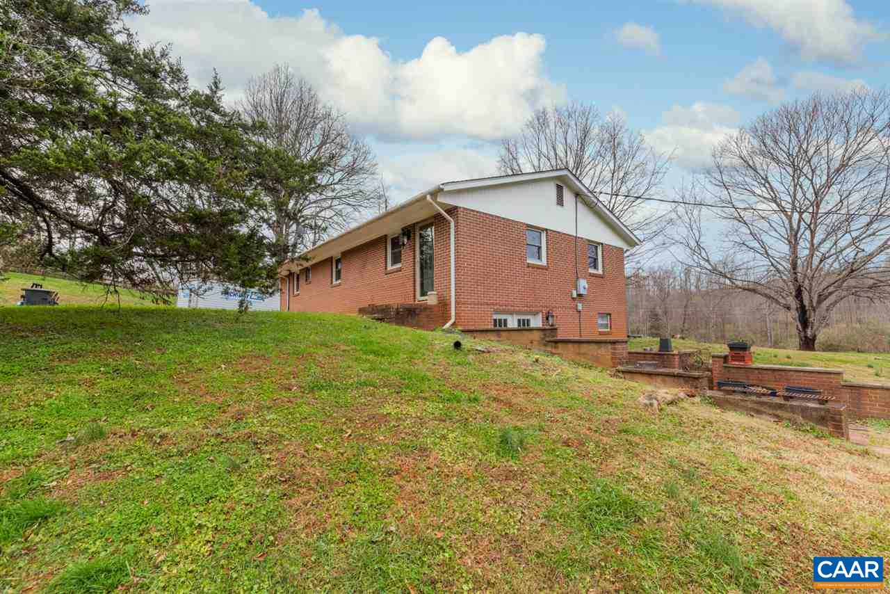 2564 Stagebridge Road Lovingston, VA 22949 - Photo 39 of 47 a view of a house with a yard