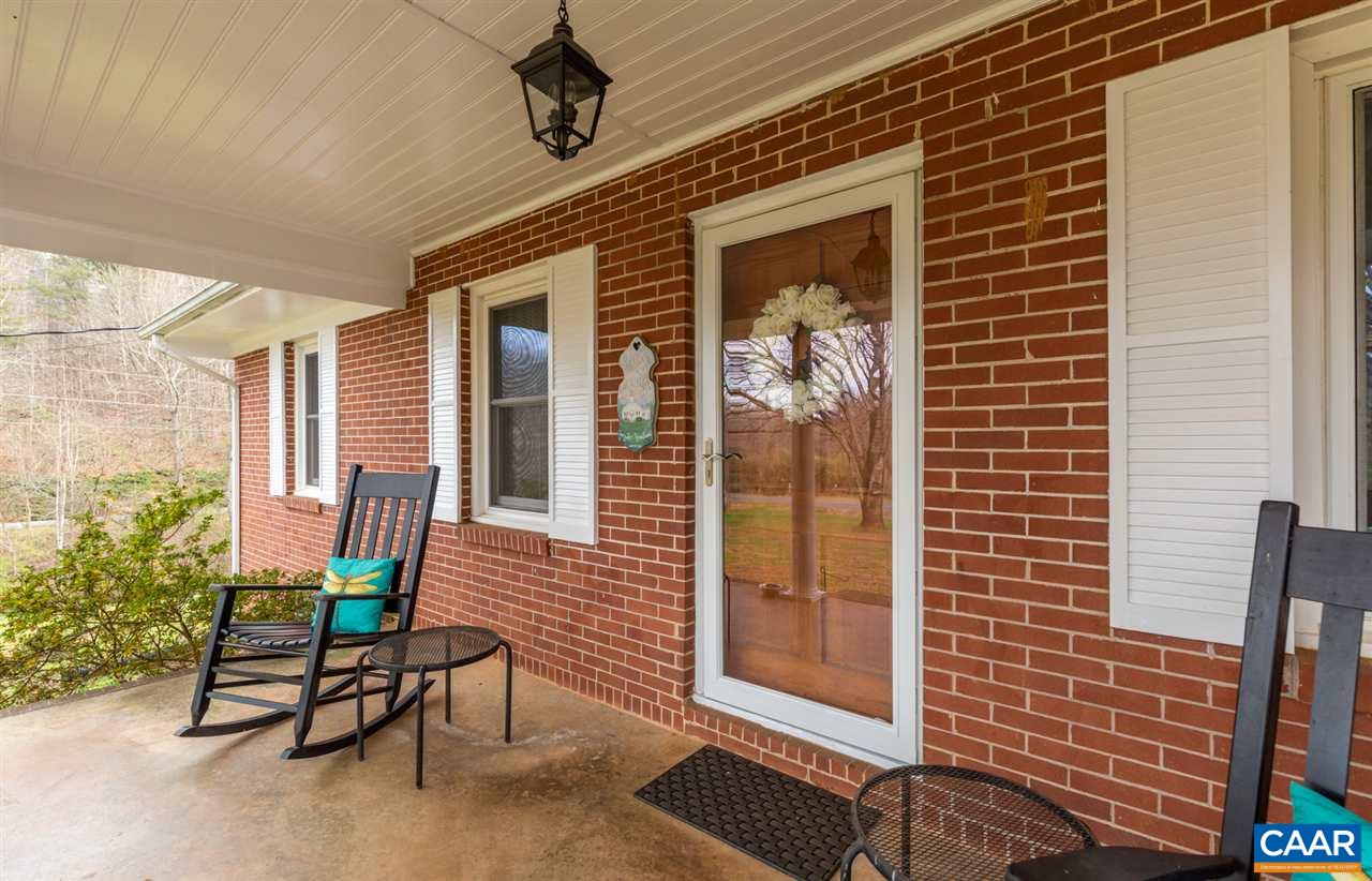 2564 Stagebridge Road Lovingston, VA 22949 - Photo 4 of 47 a building outdoor space with patio furniture