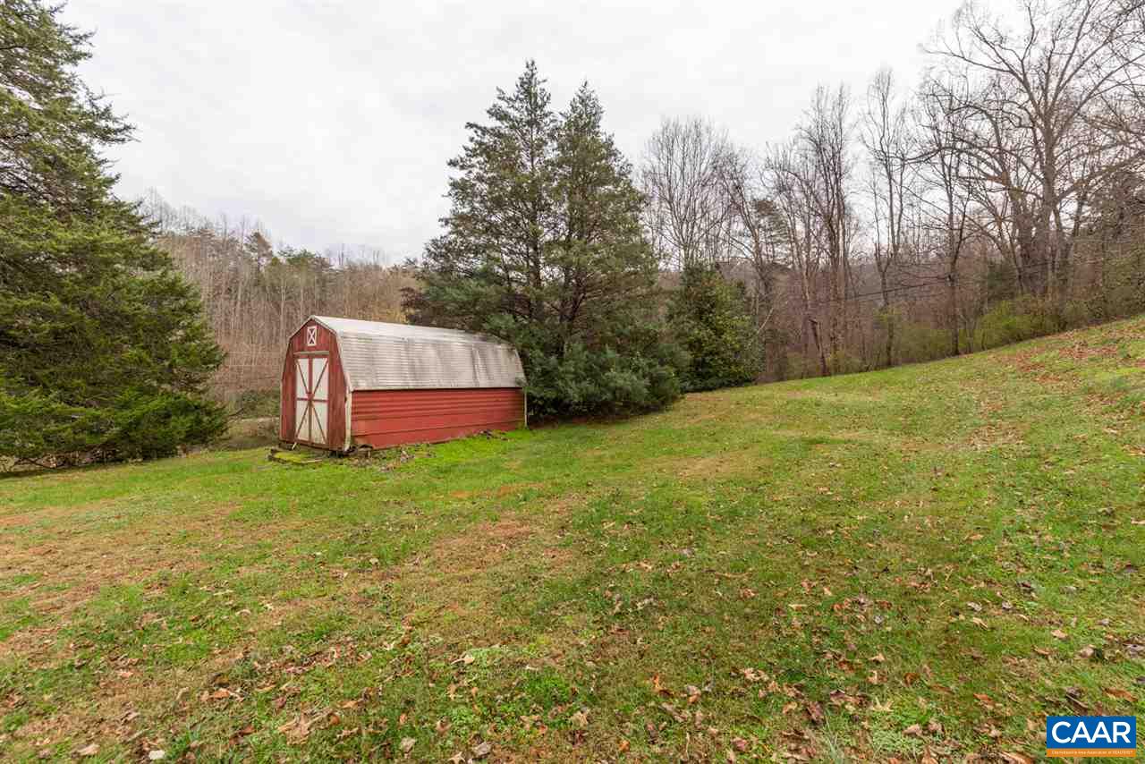 2564 Stagebridge Road Lovingston, VA 22949 - Photo 41 of 47 a view of a yard with a house