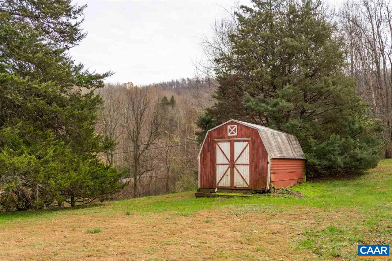 2564 Stagebridge Road Lovingston, VA 22949 - Photo 46 of 47 a backyard of a house with lots of green space