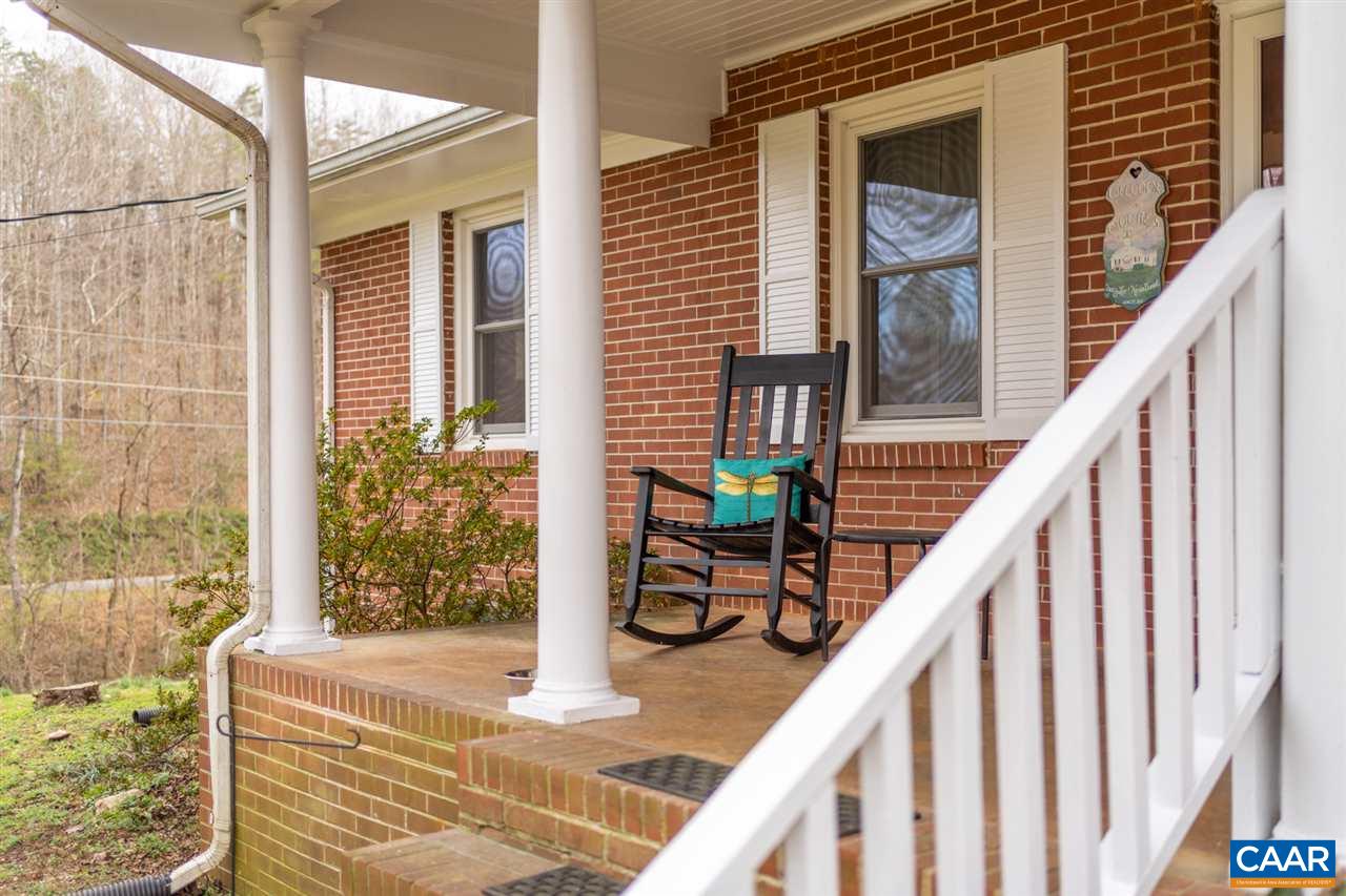 2564 Stagebridge Road Lovingston, VA 22949 - Photo 7 of 47 a balcony view with a potted plant