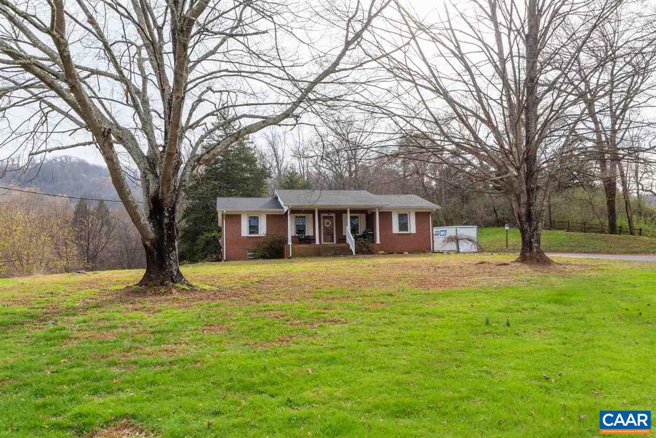 2564 Stagebridge Road Lovingston, VA 22949 - Photo 10 of 47 a front view of a house with yard and green space