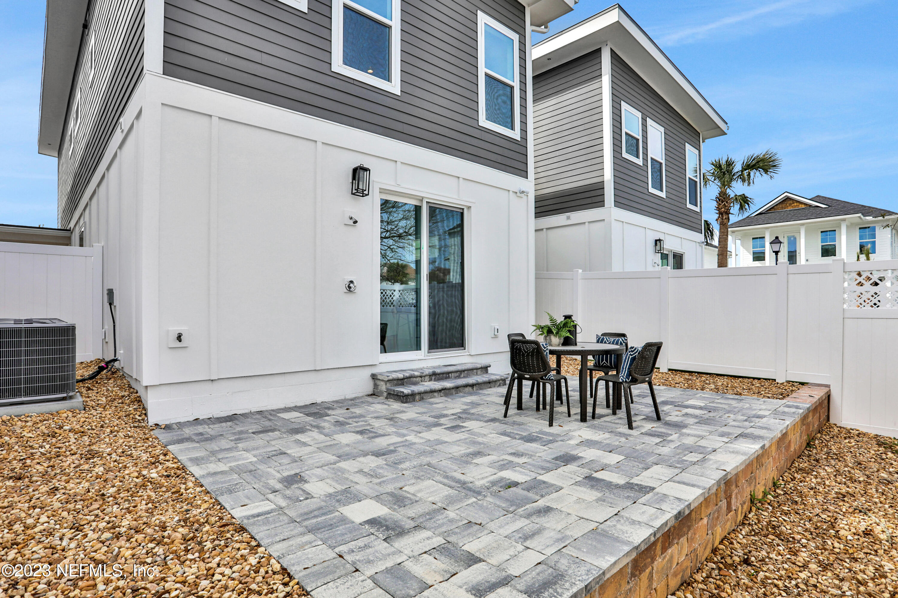 2107 Gordon Avenue Jacksonville Beach, FL 32250 - Photo 11 of 36 a view of a patio with table and chairs