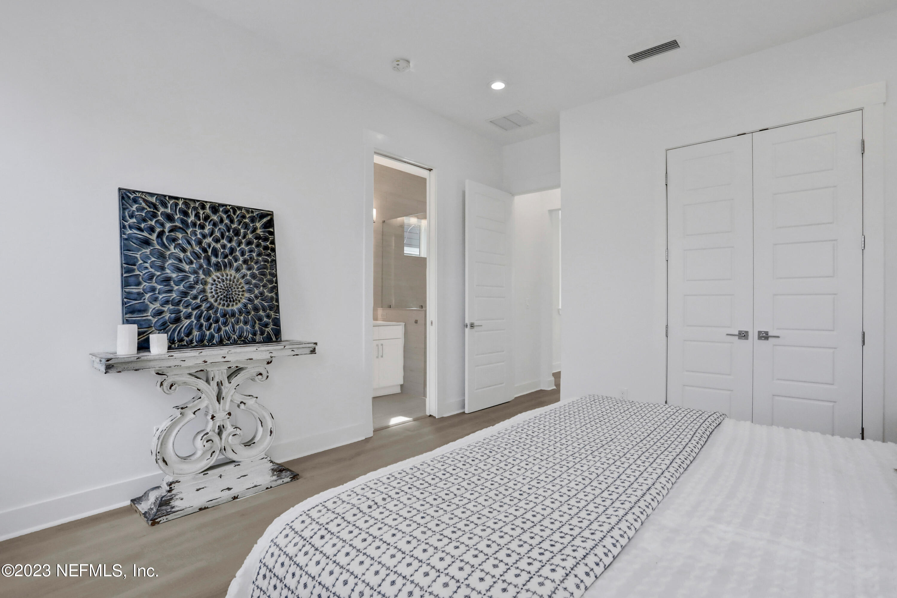2107 Gordon Avenue Jacksonville Beach, FL 32250 - Photo 30 of 36 a bedroom with a bed and a window