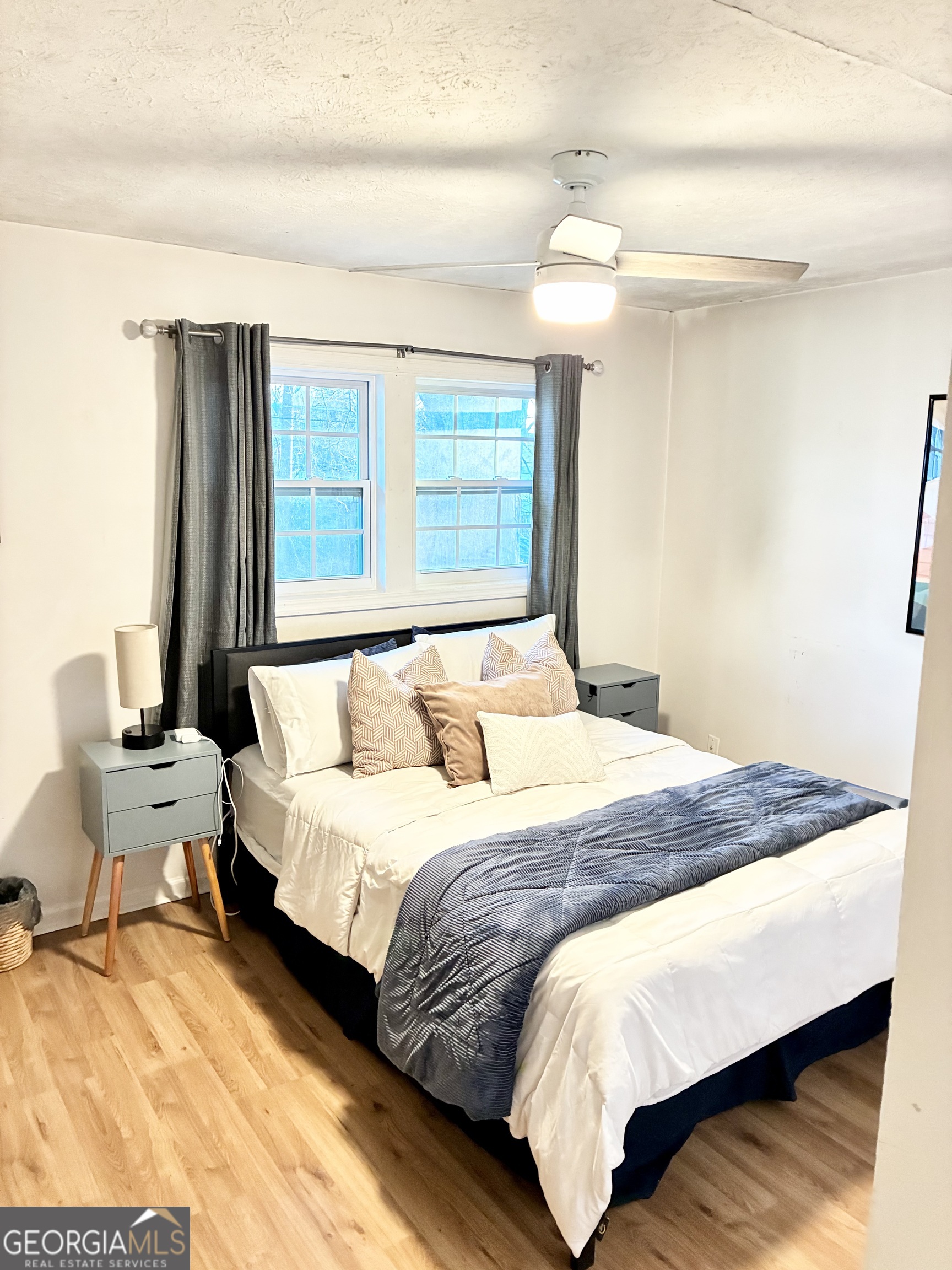 1859 Williams Avenue East Point, GA 30344 - Photo 14 of 20 a bedroom with a bed and window