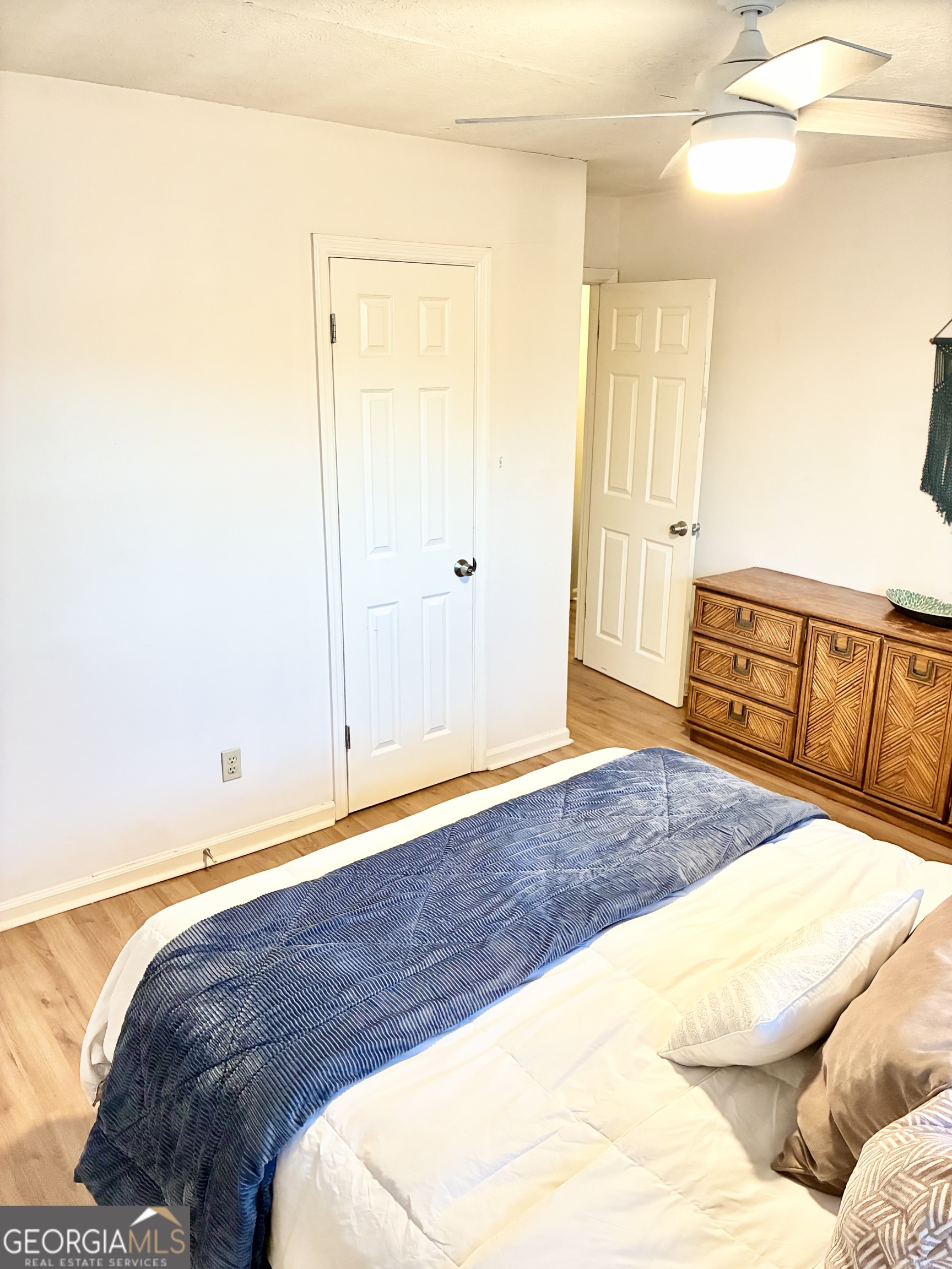 1859 Williams Avenue East Point, GA 30344 - Photo 15 of 20 a bedroom with a bed and with wooden floor