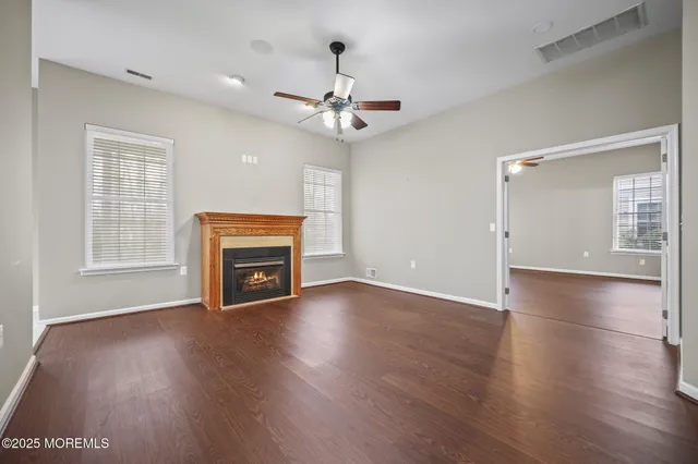 a kitchen with stainless steel appliances granite countertop a refrigerator stove top oven and sink