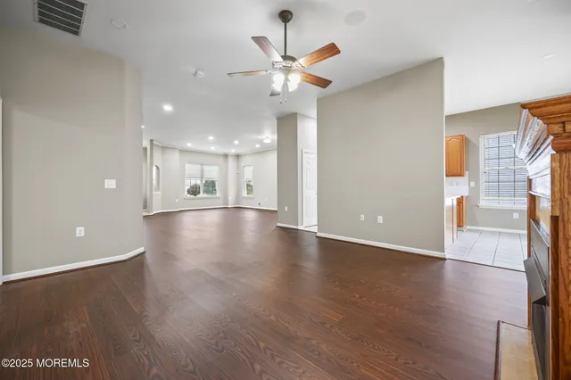 a kitchen with stainless steel appliances granite countertop a refrigerator sink and cabinets