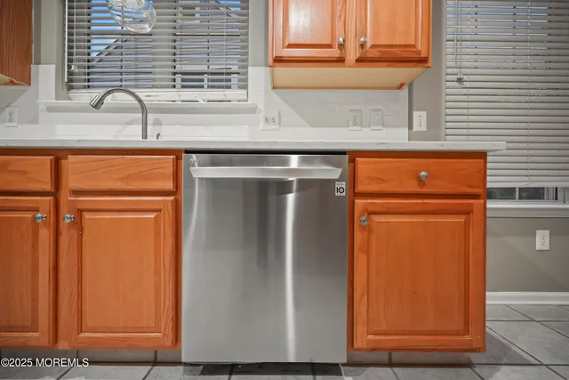 a front view of house with yard and outdoor seating