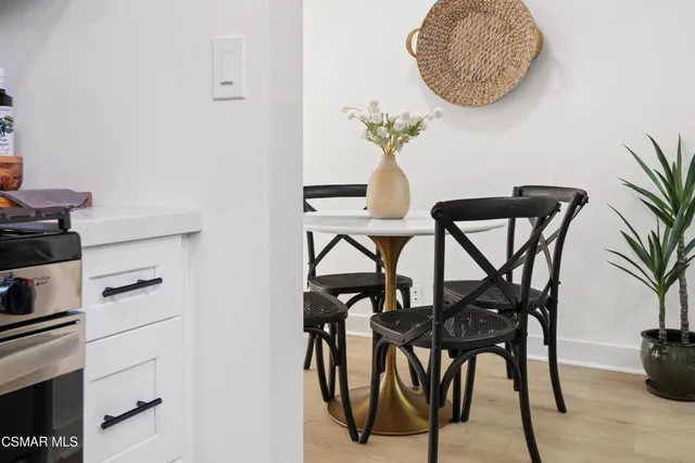 a table room with a table and chairs