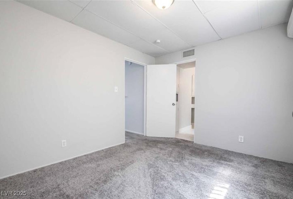 239 West Cleveland Avenue, Unit 1 Las Vegas, NV 89102 - Photo 10 of 12 Empty room featuring light carpet
