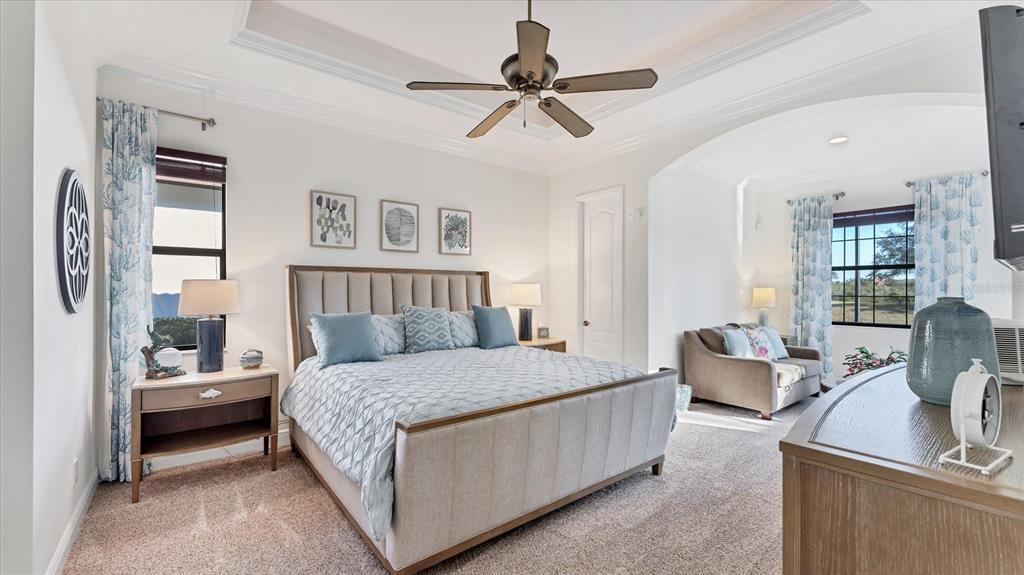 7833 Valderrama Way Lakewood Ranch, FL 34202 - Photo 17 of 63 a bedroom with a bed couch and a window