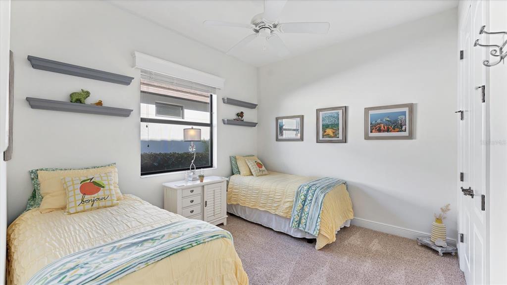 7833 Valderrama Way Lakewood Ranch, FL 34202 - Photo 29 of 63 a bedroom with a bed and a couch