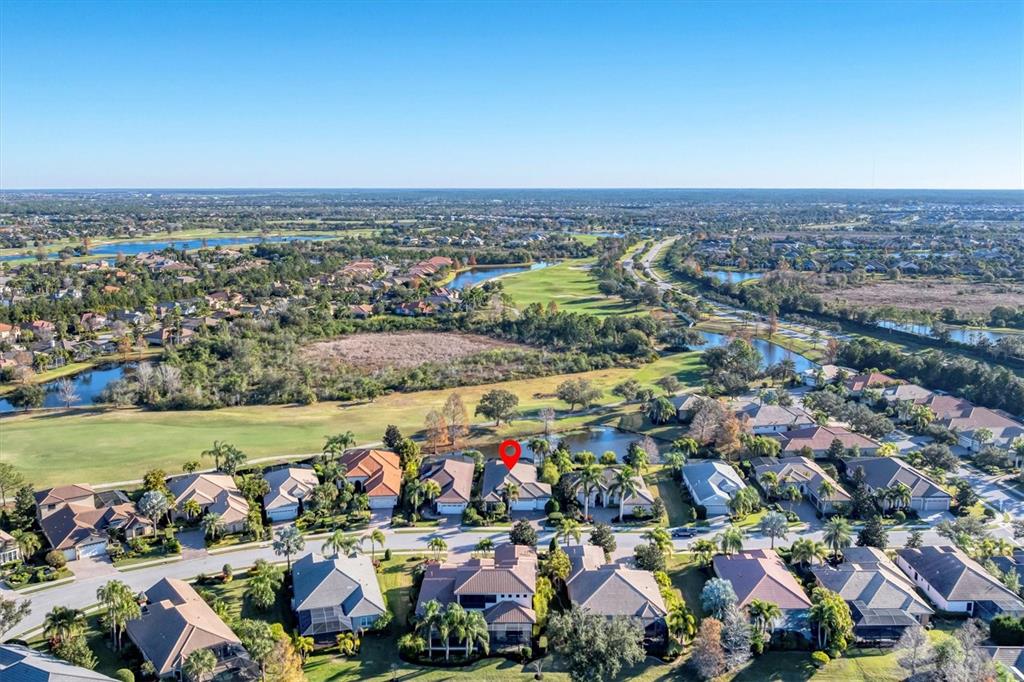 7833 Valderrama Way Lakewood Ranch, FL 34202 - Photo 3 of 63 an aerial view of a city